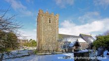 Photo of Ruan Minor Church taken from the ground in the snow. It is actually 6 photos stitched together as I could not get back far enough to get it all in.